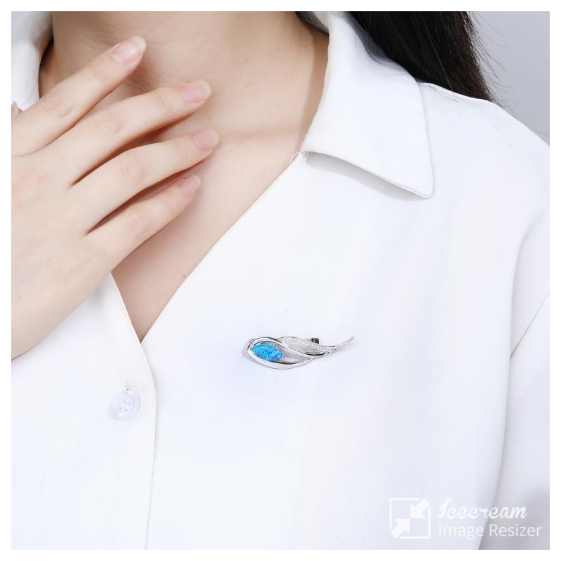 BROSZKA DAMSKA ŁEZKA Z NIEBIESKIM OPALEM SREBRO 925